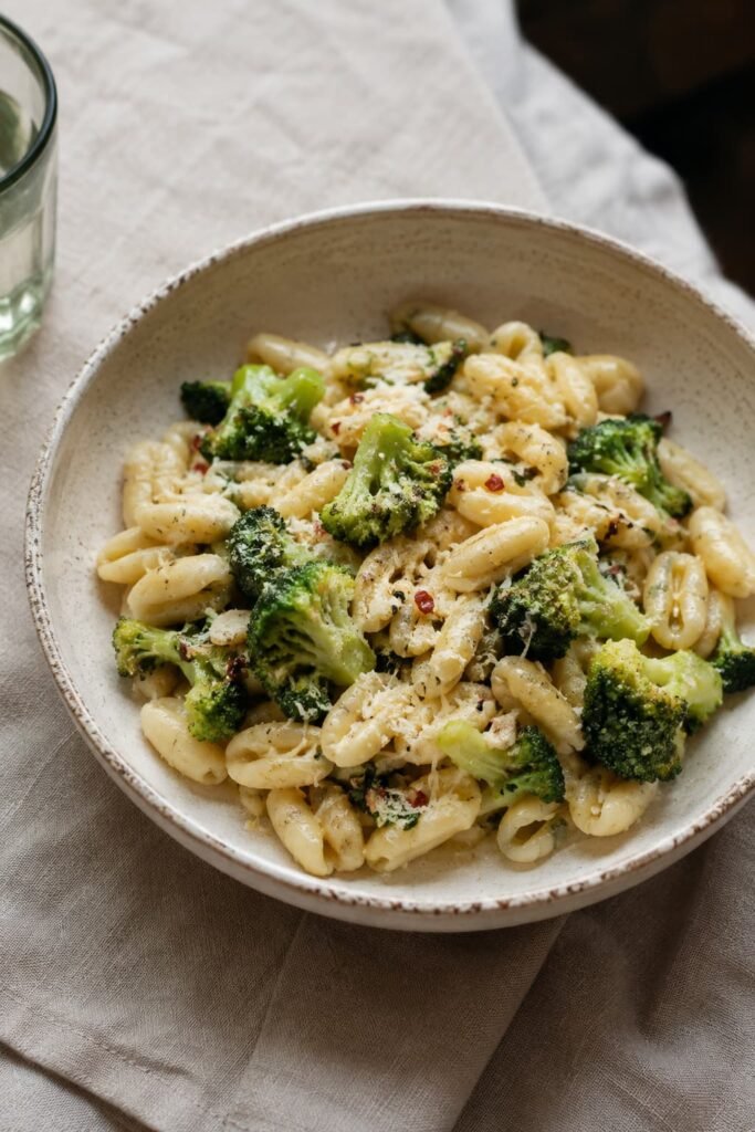 Cavatelli pasta with broccoli, olive oil, garlic, and grated cheese