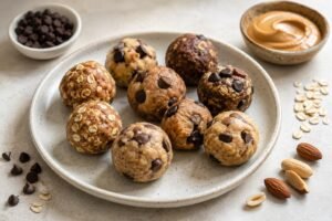 Cookie dough bites with oats, chocolate chips, nuts, and nut butter shown as general ingredient examples